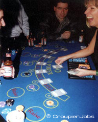 A croupier dealing cards